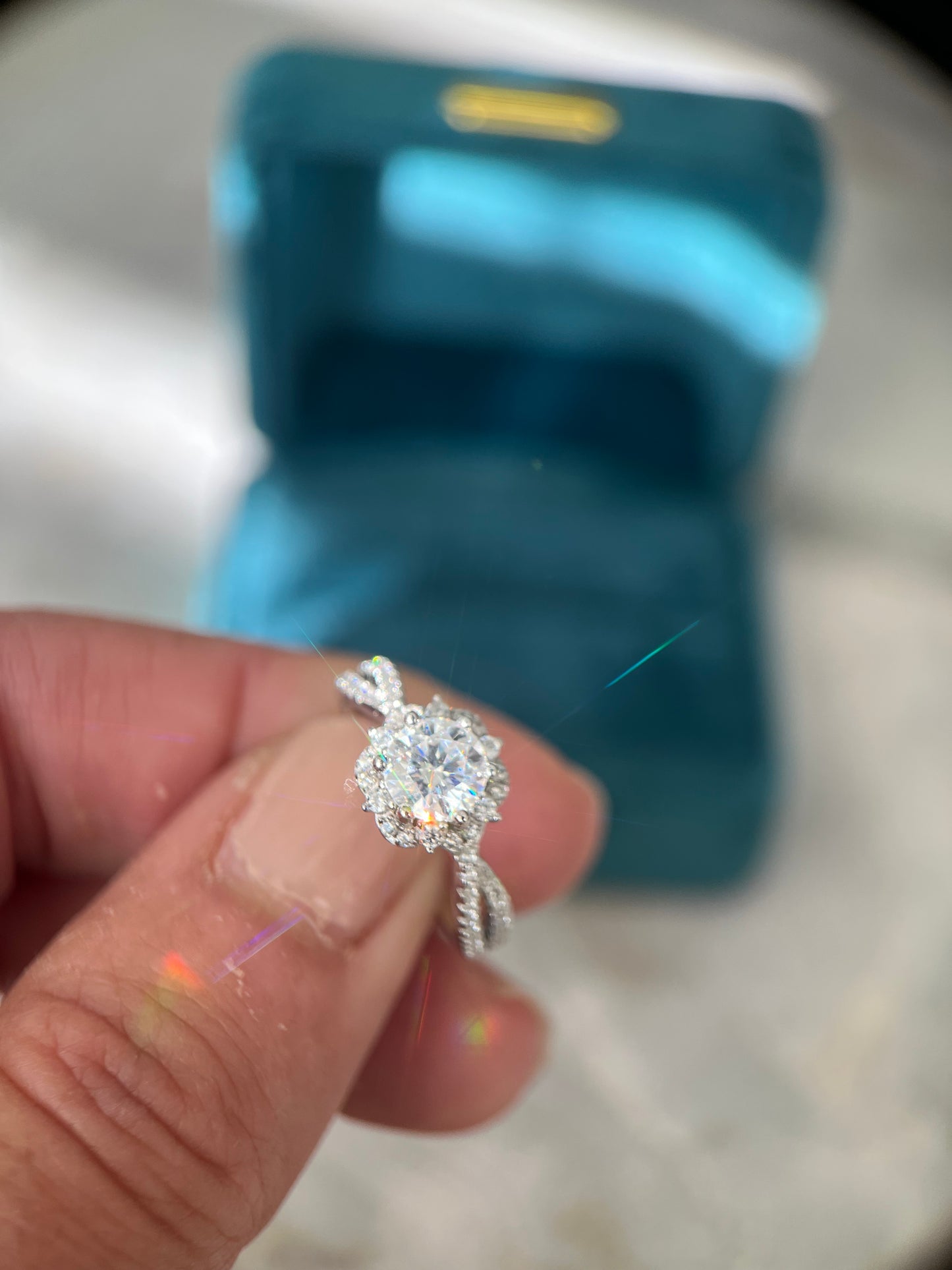 Silver hidden rose Moissanite ring