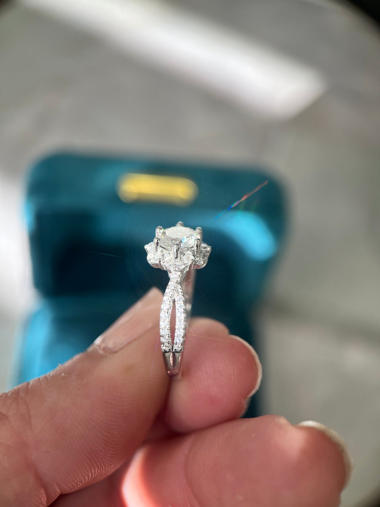 Silver hidden rose Moissanite ring