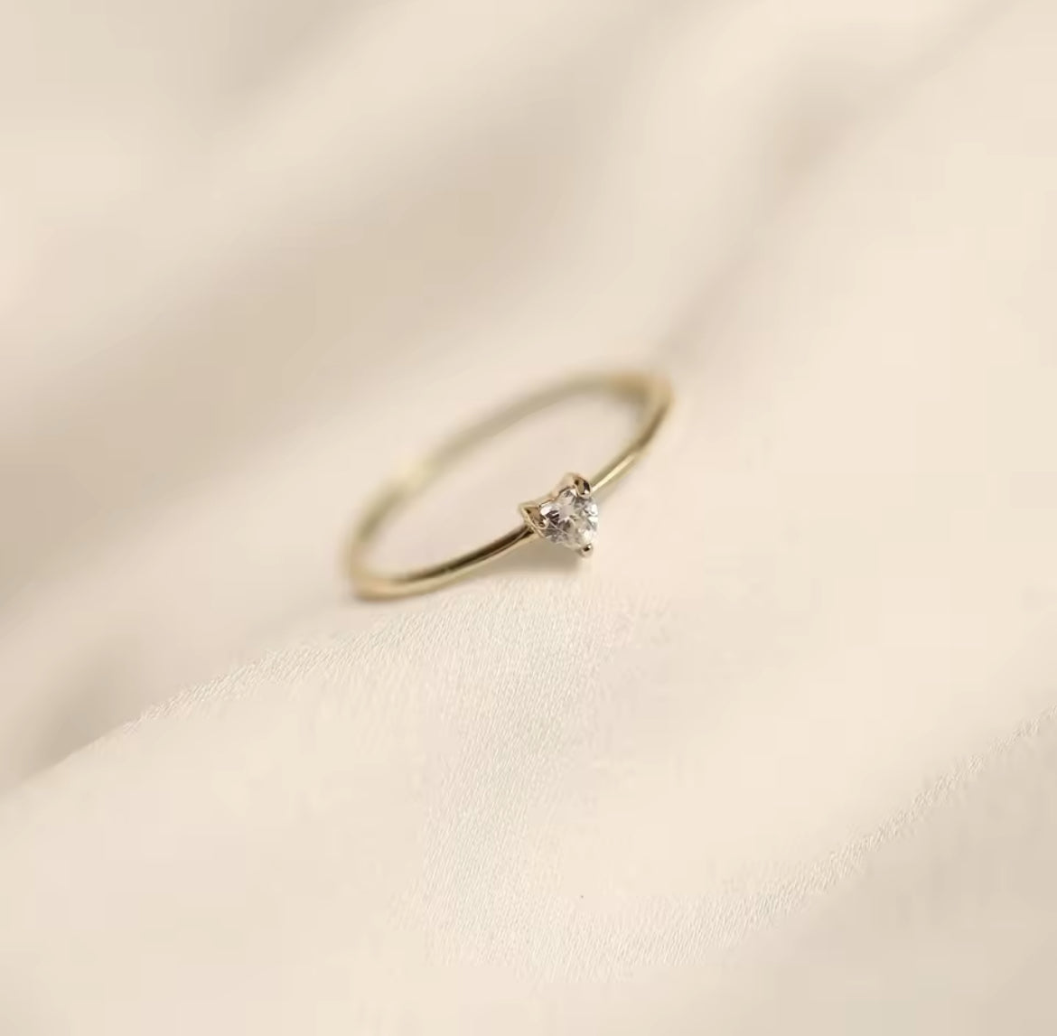 Gold heart solitaire ring